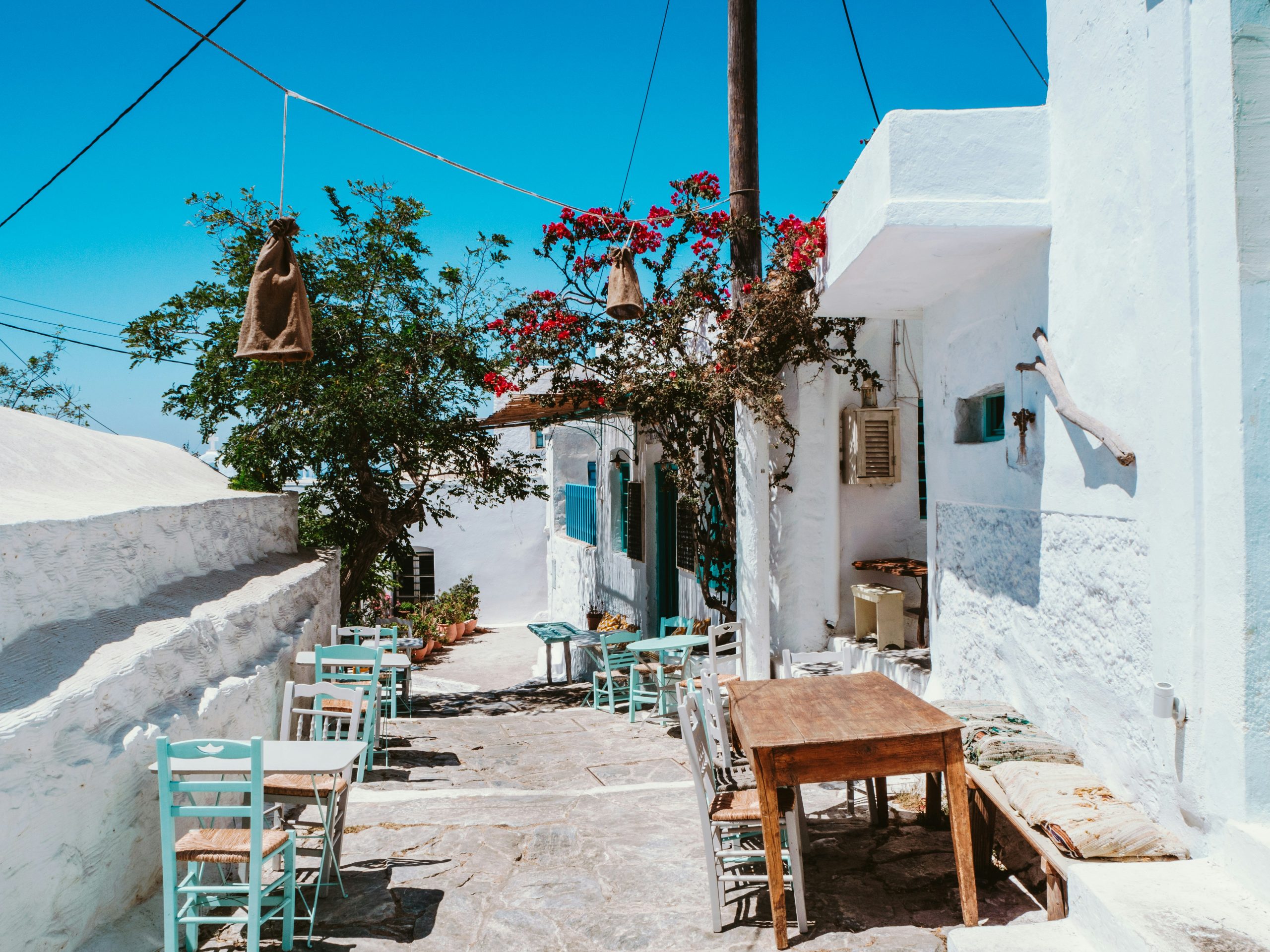 explore the beautiful greek islands and discover the stunning beaches, ancient ruins, and charming villages on your next vacation.