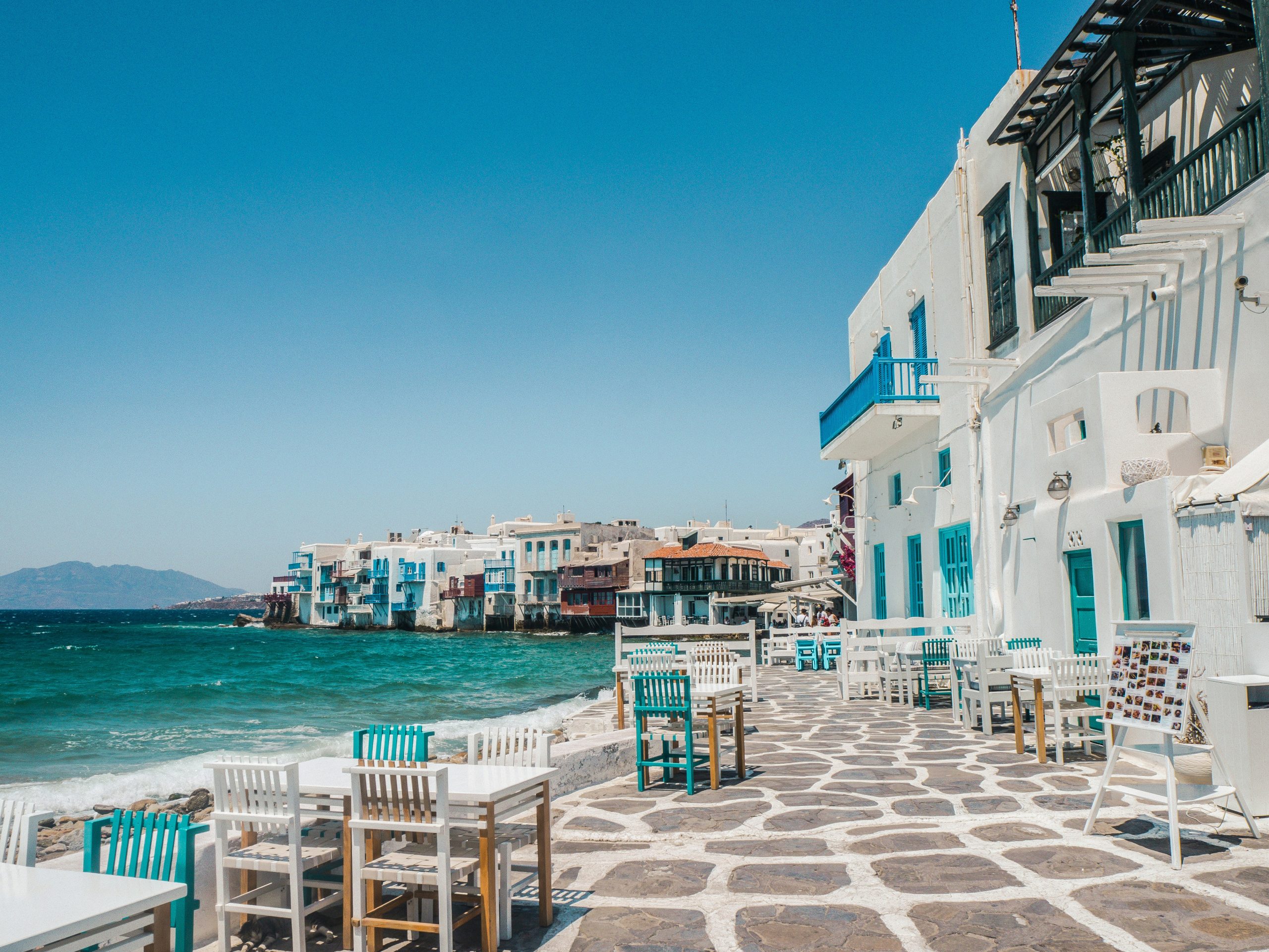 explore the stunning cyclades islands and discover the beauty of the aegean sea with its charming towns, white-washed buildings, and picturesque beaches.